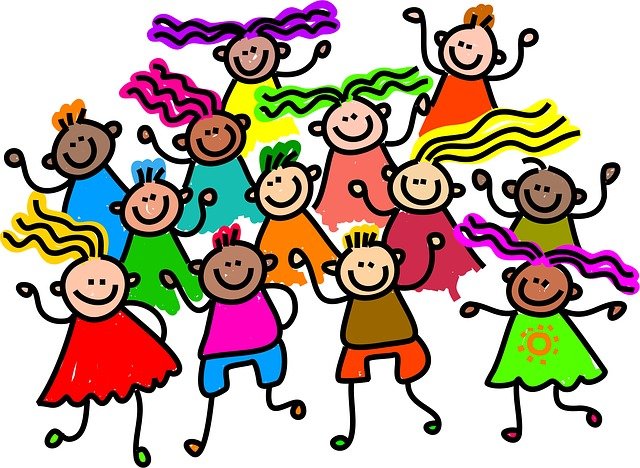 A group of dancing children with colorful clothing and bodies.